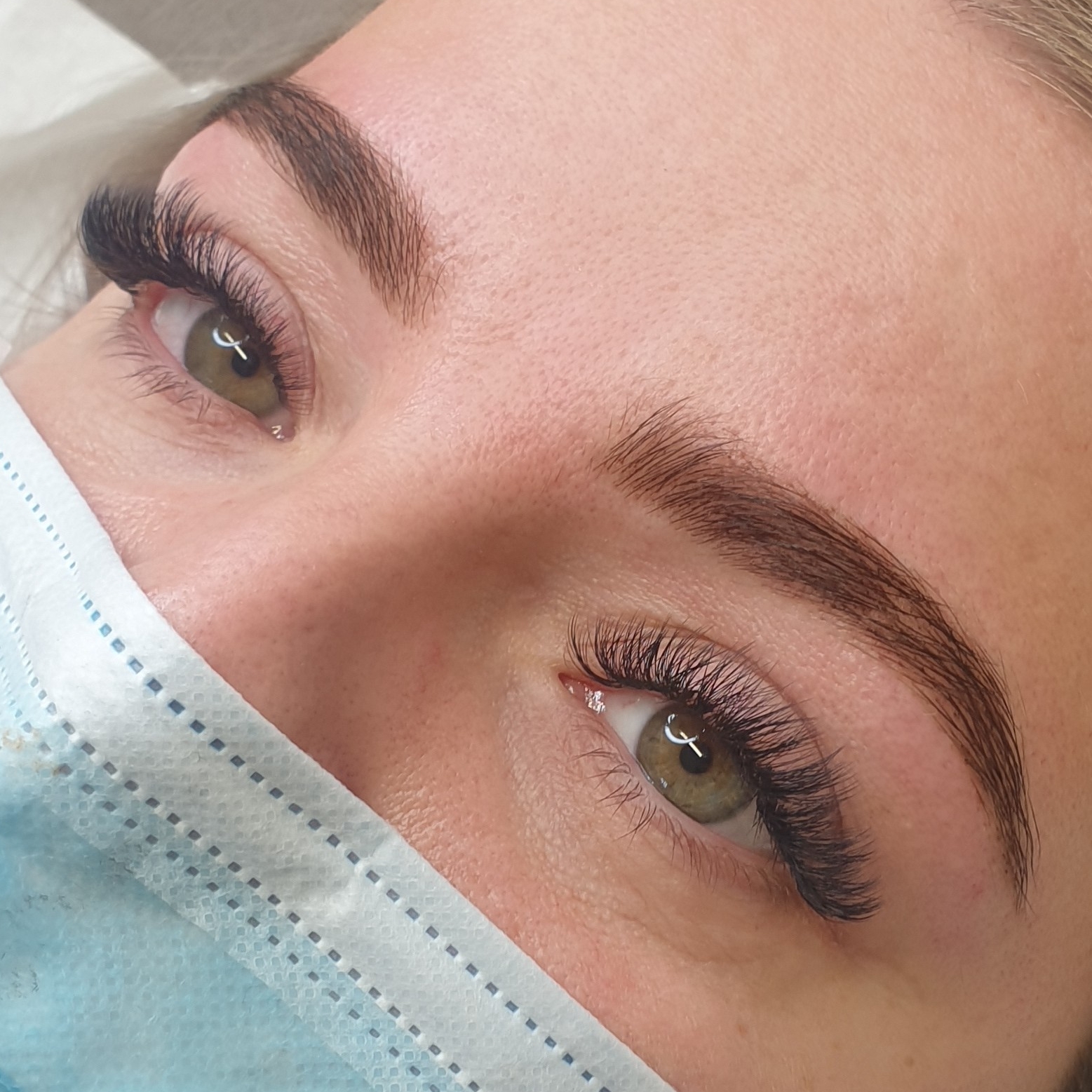 Lash extensions with laminated brows